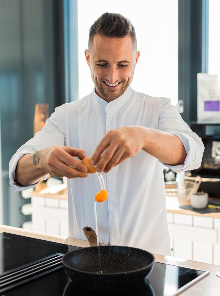 Chef Ben cooking eggs